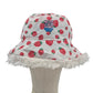 Reversible strawberry bucket hat - red green white fur